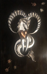 Capricornus. Puzzle calamitato: gesso a oro, foglia d'argento e di rame, lastra di ferro ossidata montata su plexiglass. Dim. 70 x 47 cm.
