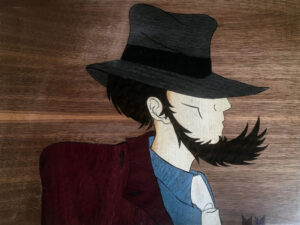 Omaggio a Lupin. Intarsio ligneo. Dim. 50 x 40 cm.
