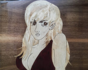 Omaggio a Lupin. Intarsio ligneo. Dim. 50 x 40 cm.